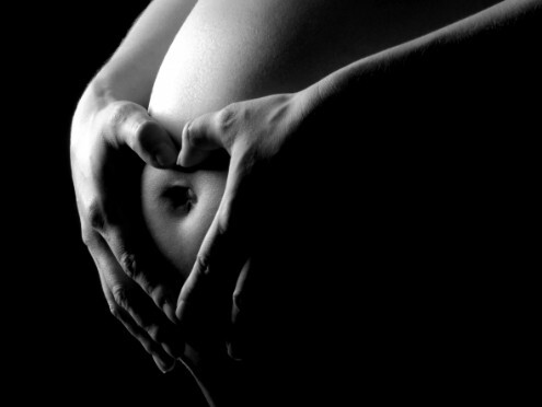 Babybauch mit Herz, Fotografie
